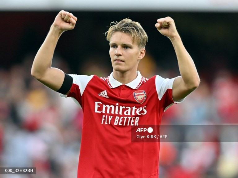 Cuộc lội ngược dòng của Arsenal nhờ công lớn của Odegaard. Ảnh: AFP