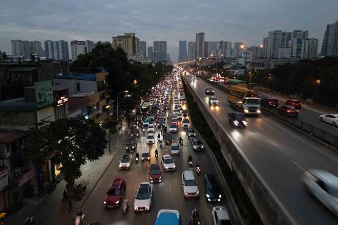 Cần quy định mức hỗ trợ cụ thể cho việc chuyển đổi xe xăng sang xe điện ở Hà Nội