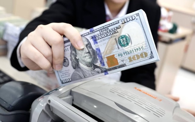 Tỷ giá trong nước diễn biến ngược chiều với thế giới - Ảnh minh họa