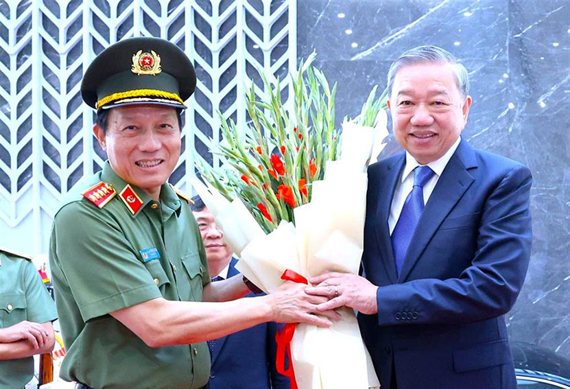 Bộ trưởng Bộ Công an - Đại tướng Lương Tam Quang (trái) tiếp đón Tổng Bí thư Tô Lâm. Ảnh: Bộ Công an