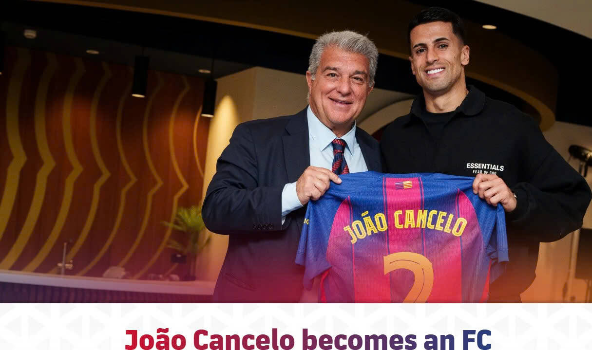 Joao Cancelo được giới thiệu trên trang chủ Barcelona. Ảnh: AFP