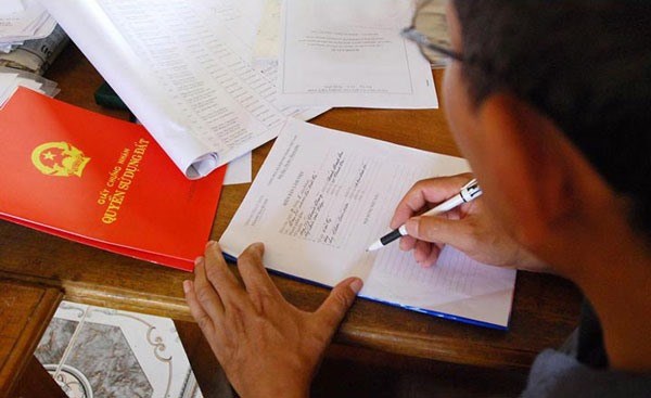 Bộ Tư pháp làm rõ giao dịch đặt cọc mua bán nhà đất có phải công chứng hay không