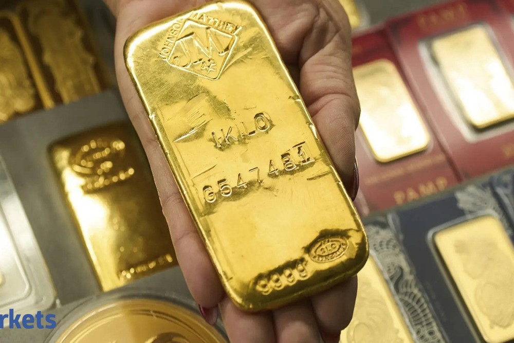 Giá vàng hạ nhiệt khi dầu tăng và thị trường chờ tín hiệu mới từ Fed. Ảnh: The Economic Times Giá vàng hạ nhiệt khi dầu tăng và thị trường chờ tín hiệu mới từ Fed. Ảnh: The Economic Times
